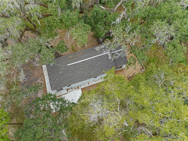 an aerial view of residential house with outdoor space