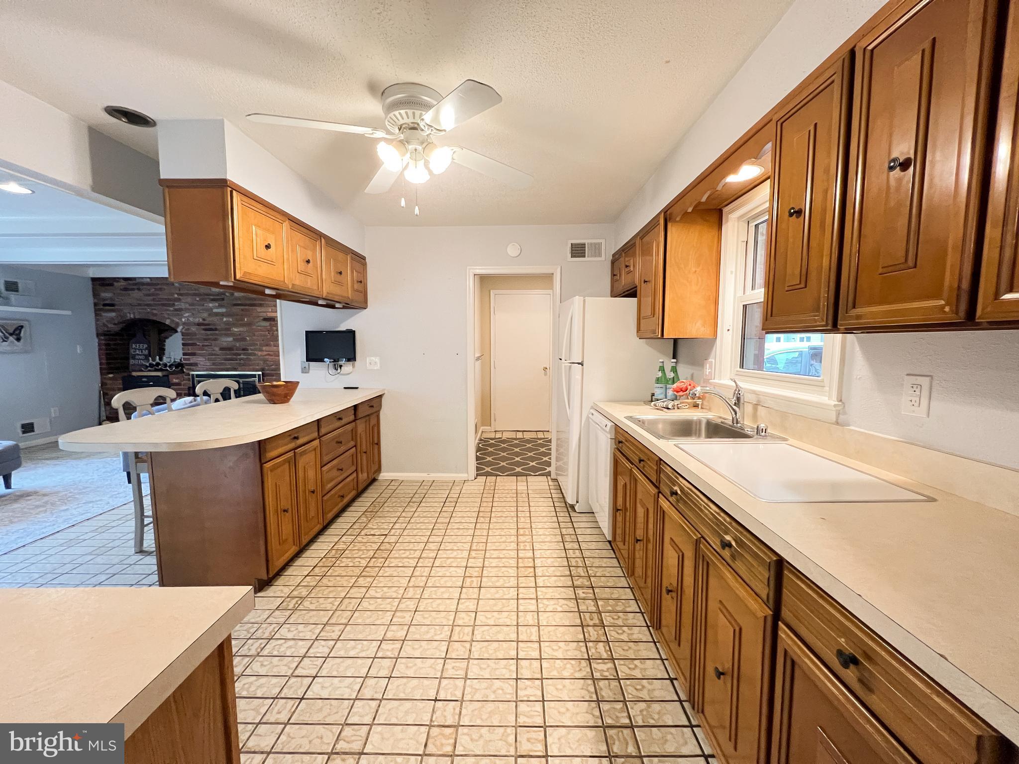 Kitchen - doorway to Mudroom, Half Bath, & Garage