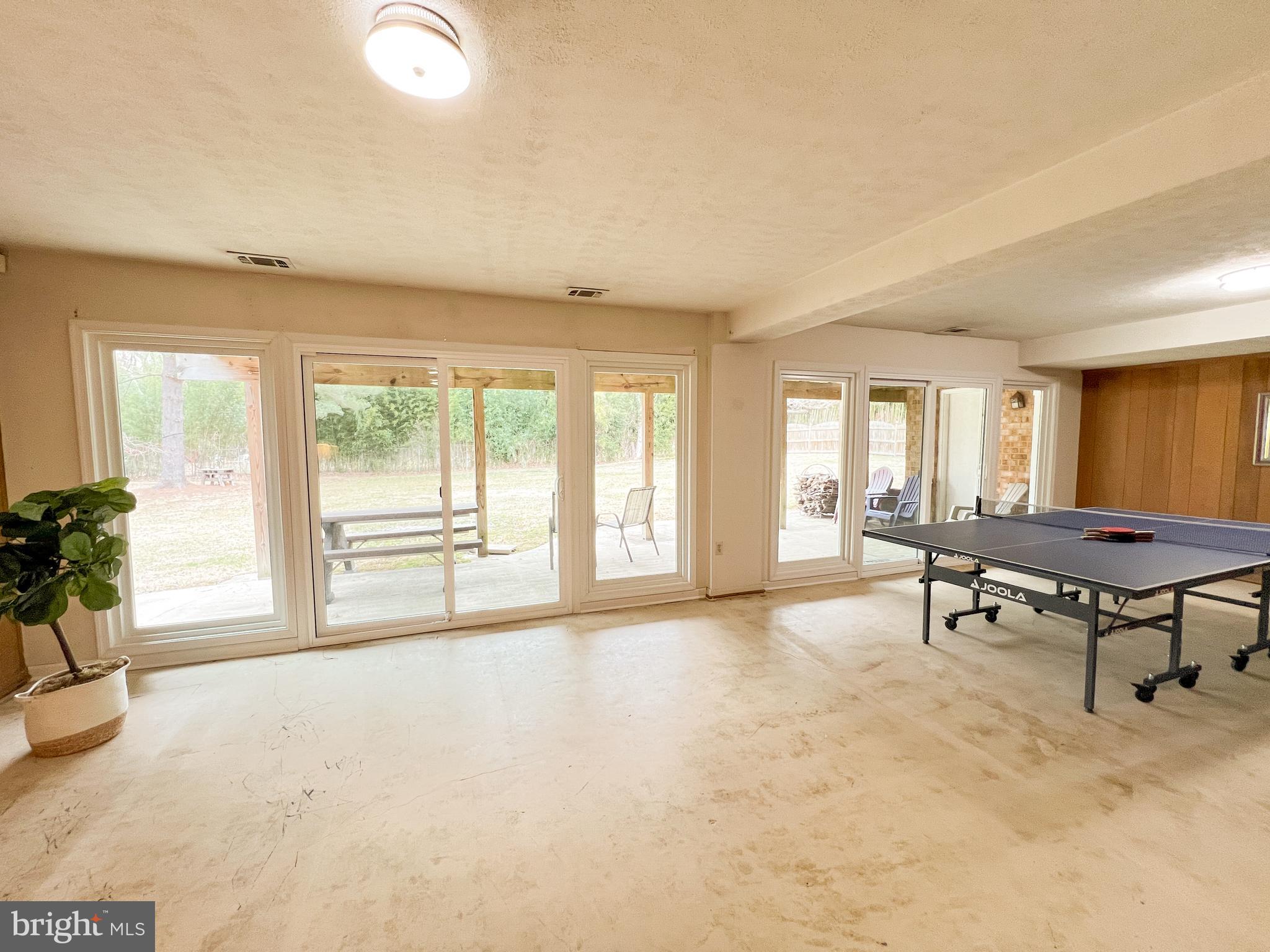 2503 North Gate Terrace Silver Spring, MD 20906 - Photo 45 of 50 Basement with Wall of Windows and Sliding Doors