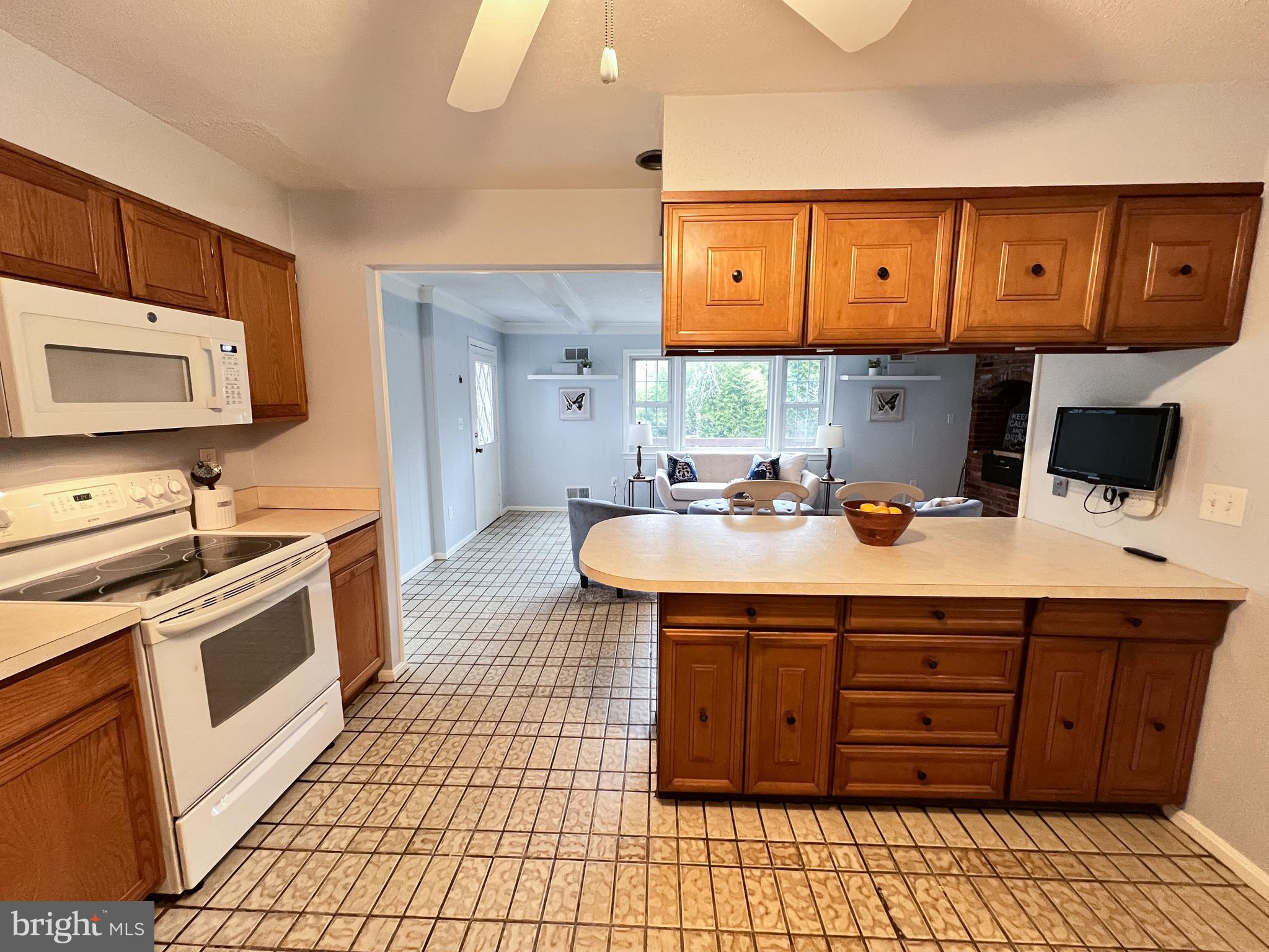 Kitchen with view into Sitting Area