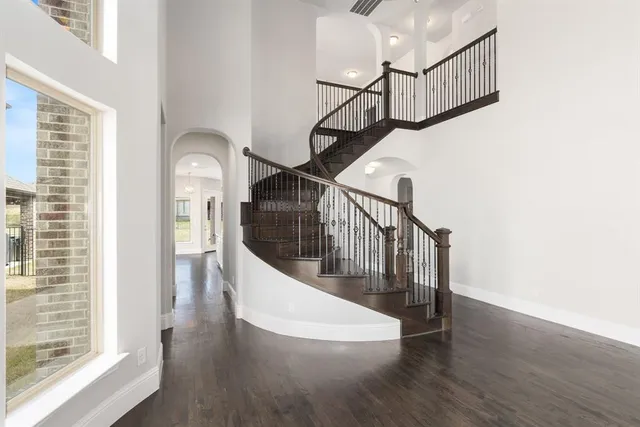 a view of entryway with wooden floor