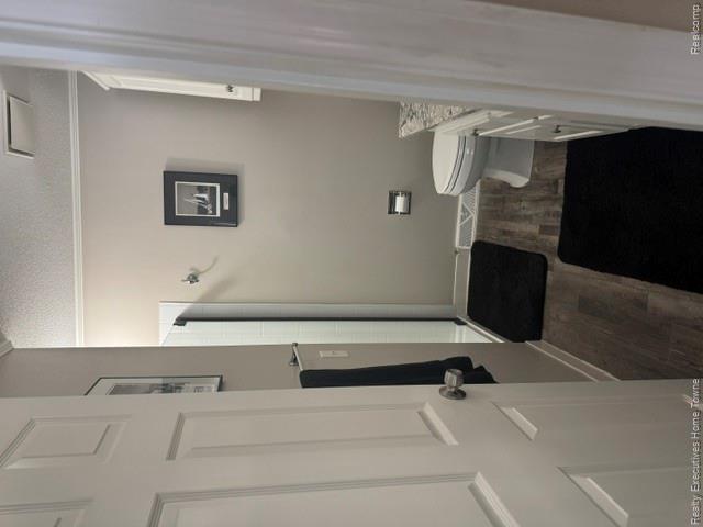 1467 Krafft Road, Unit 8 Port Huron, MI 48060 - Photo 14 of 28 Bathroom featuring wood-finish flooring, a white vanity with a stone-look countertop, a toilet, and a stand-up shower with a glass enclosure