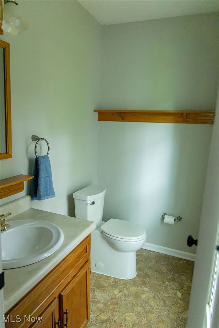 3333 Dayton Road Madison, OH 44057 - Photo 15 of 48 Bathroom featuring toilet and vanity