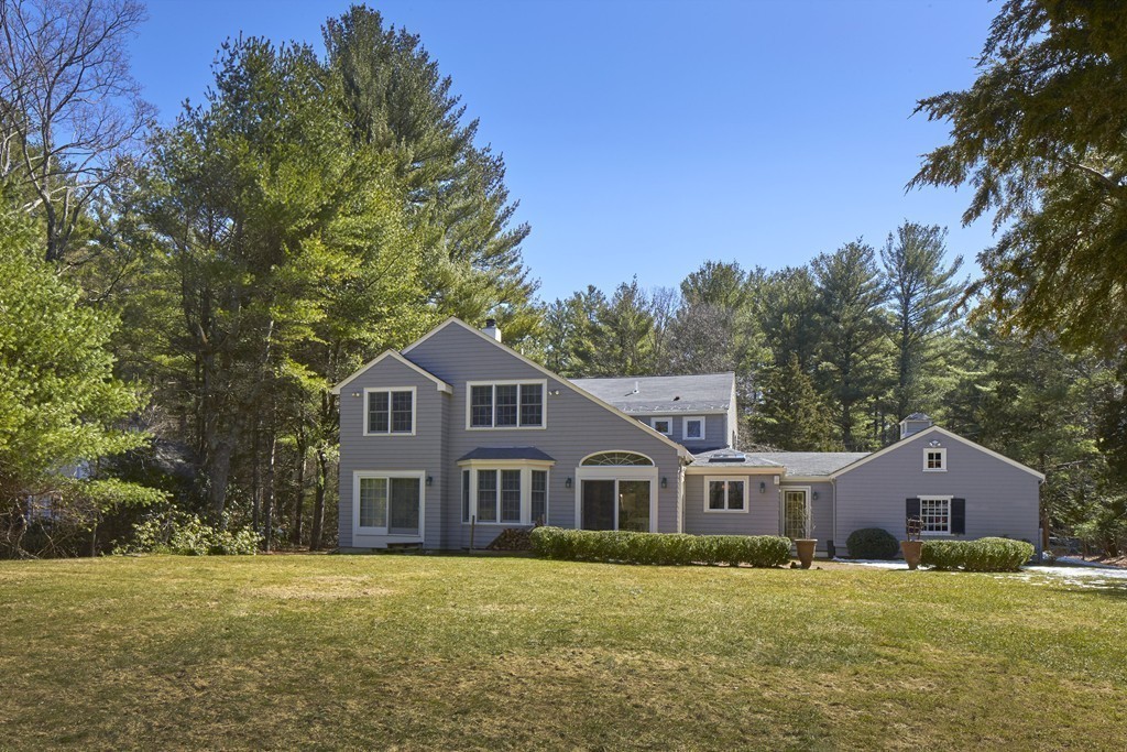 65 Montvale Road Weston, MA 02493 - Photo 11 of 11 a front of a house with a yard