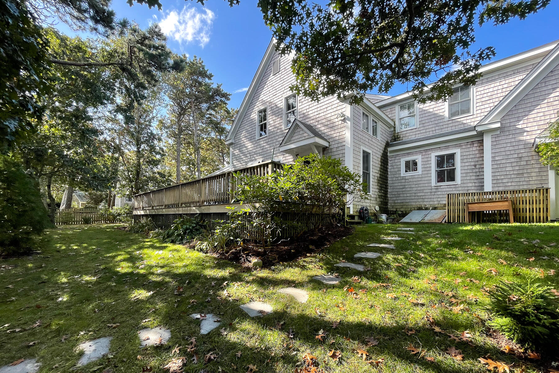 23 Forest Beach Rd Extension South Chatham, MA 02659 - Photo 12 of 43 a backyard of a house with lots of green space