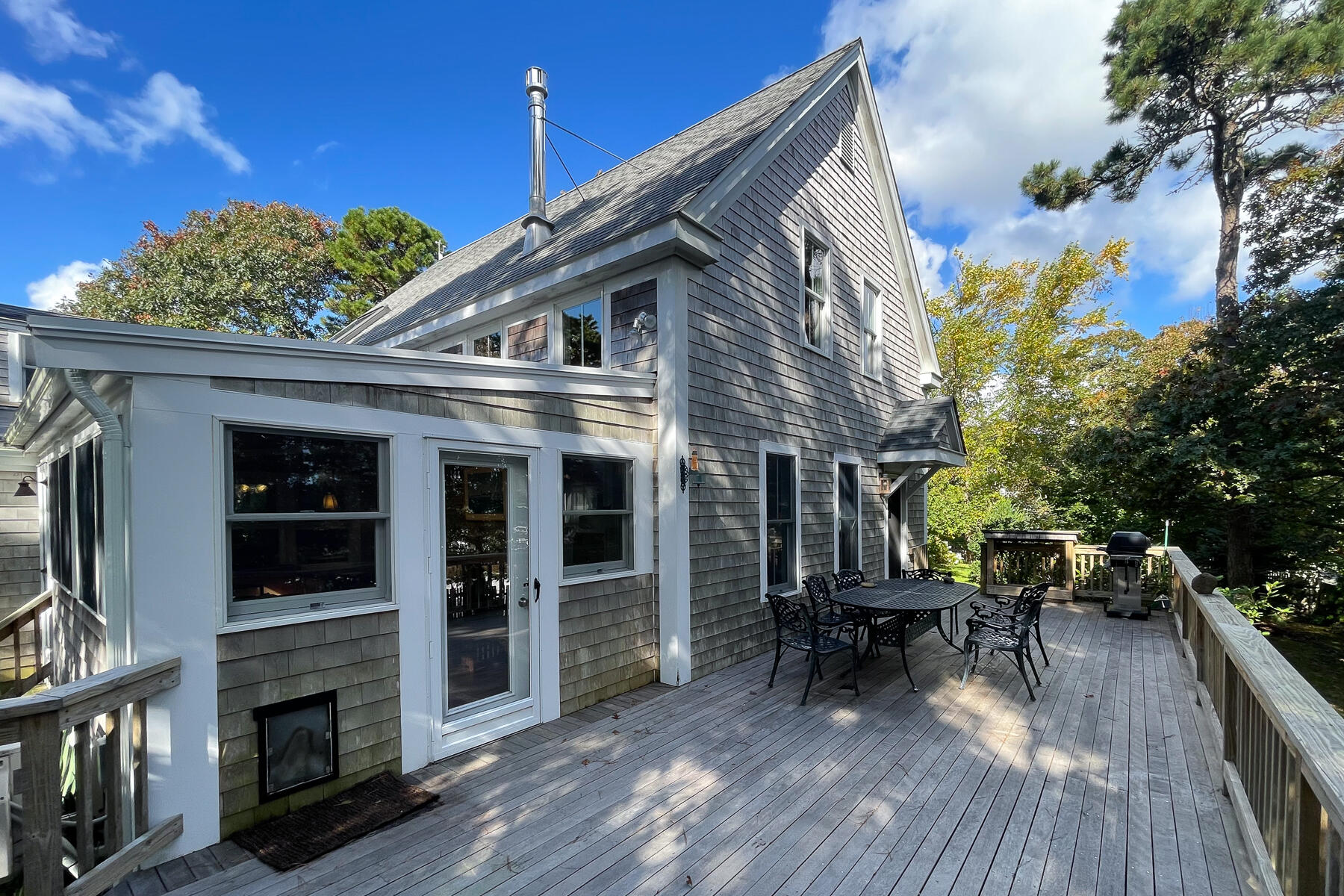 23 Forest Beach Rd Extension South Chatham, MA 02659 - Photo 14 of 43 a view of a house with sitting area and furniture