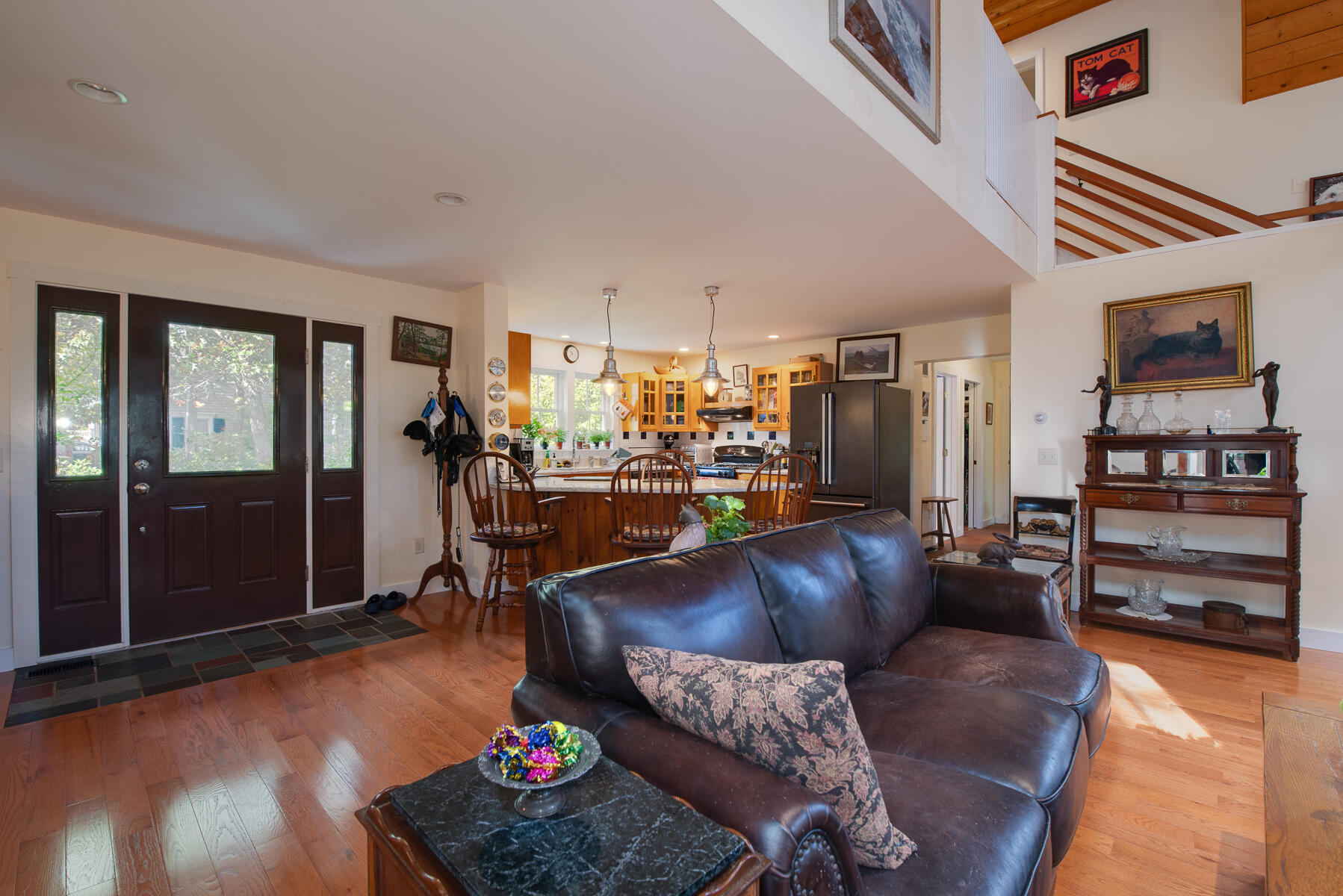 23 Forest Beach Rd Extension South Chatham, MA 02659 - Photo 21 of 43 a living room with furniture and a wooden floor
