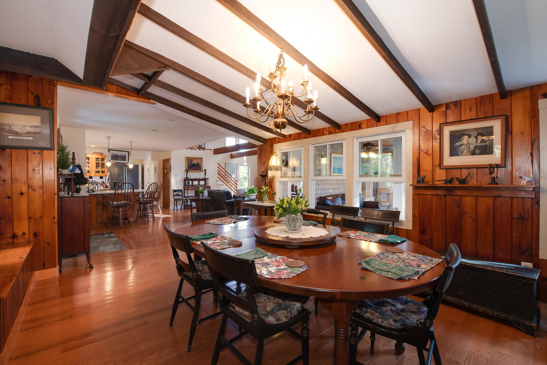 23 Forest Beach Rd Extension South Chatham, MA 02659 - Photo 25 of 43 a view of a dining room with furniture and wooden floor