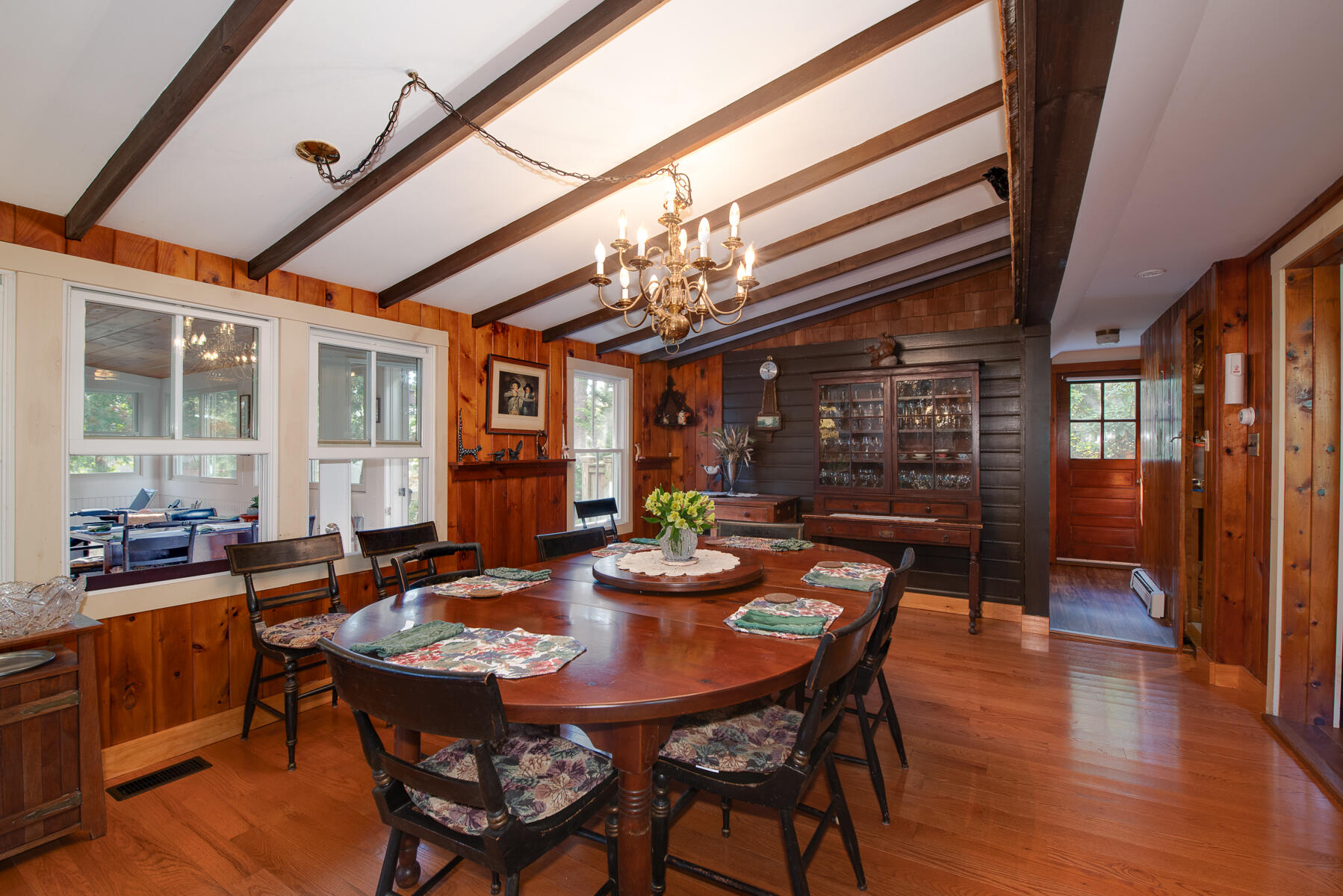 23 Forest Beach Rd Extension South Chatham, MA 02659 - Photo 26 of 43 a view of a dining room with furniture window and wooden floor
