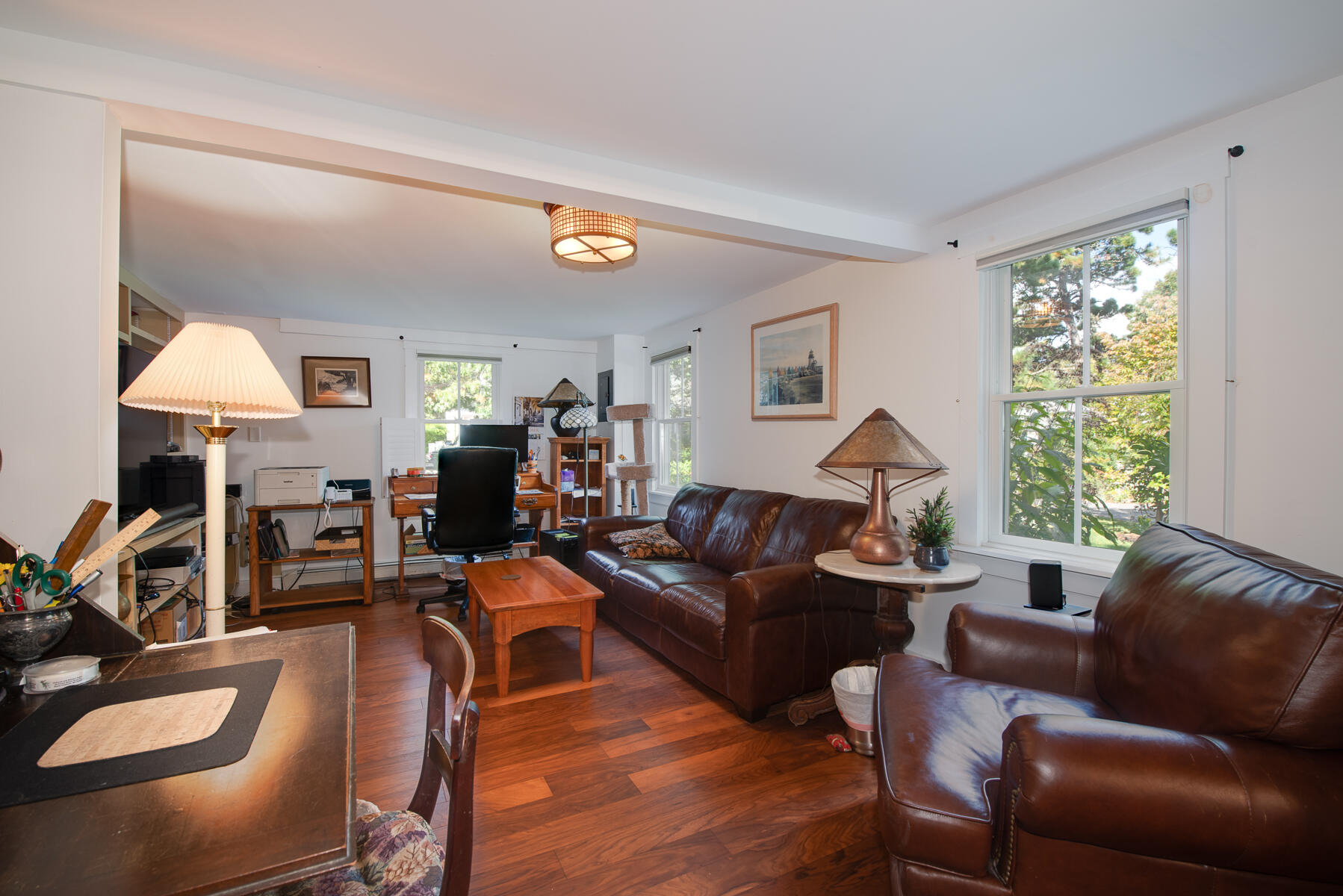 23 Forest Beach Rd Extension South Chatham, MA 02659 - Photo 30 of 43 a living room with furniture and a wooden floor