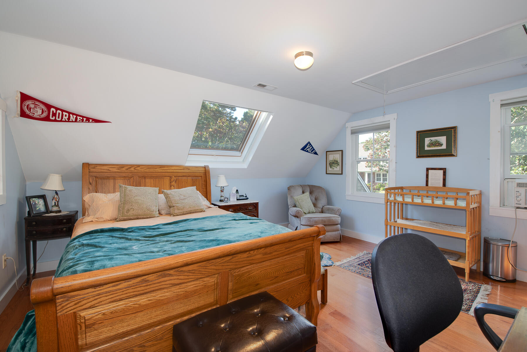 23 Forest Beach Rd Extension South Chatham, MA 02659 - Photo 34 of 43 a bedroom with a bed and wooden floor