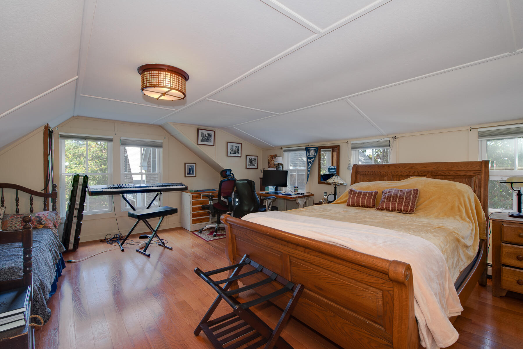 23 Forest Beach Rd Extension South Chatham, MA 02659 - Photo 36 of 43 a bed room with a bed and a chair