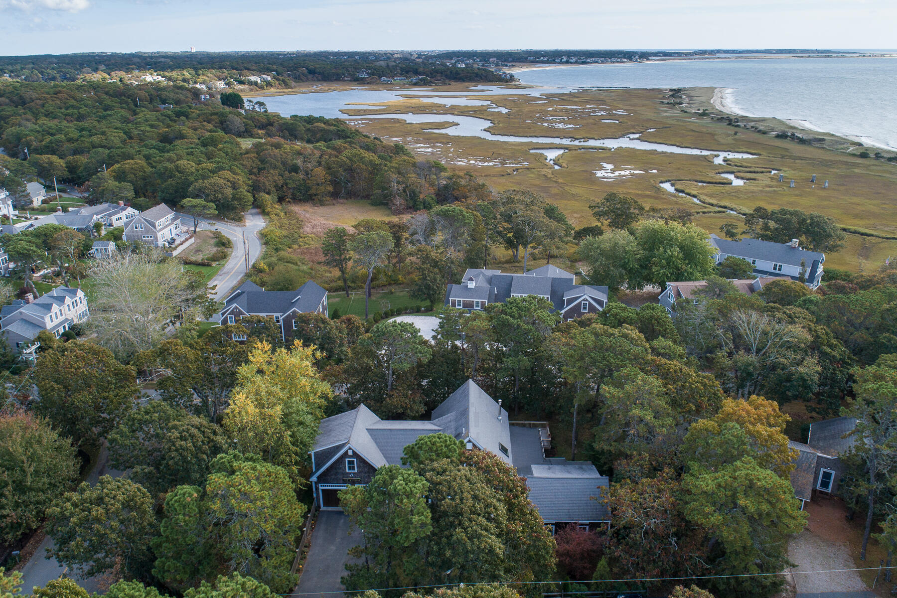 23 Forest Beach Rd Extension South Chatham, MA 02659 - Photo 4 of 43 an aerial view of ocean and residential houses with outdoor space and trees
