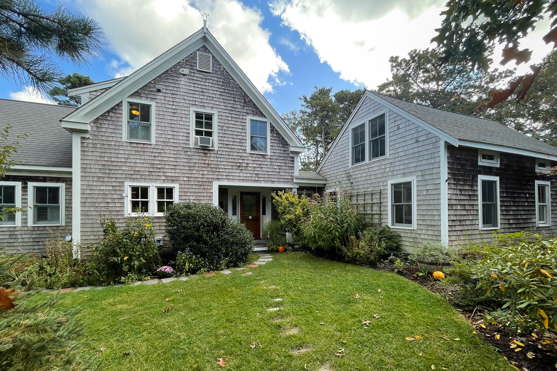 23 Forest Beach Rd Extension South Chatham, MA 02659 - Photo 8 of 43 a view of a house with a yard and plants