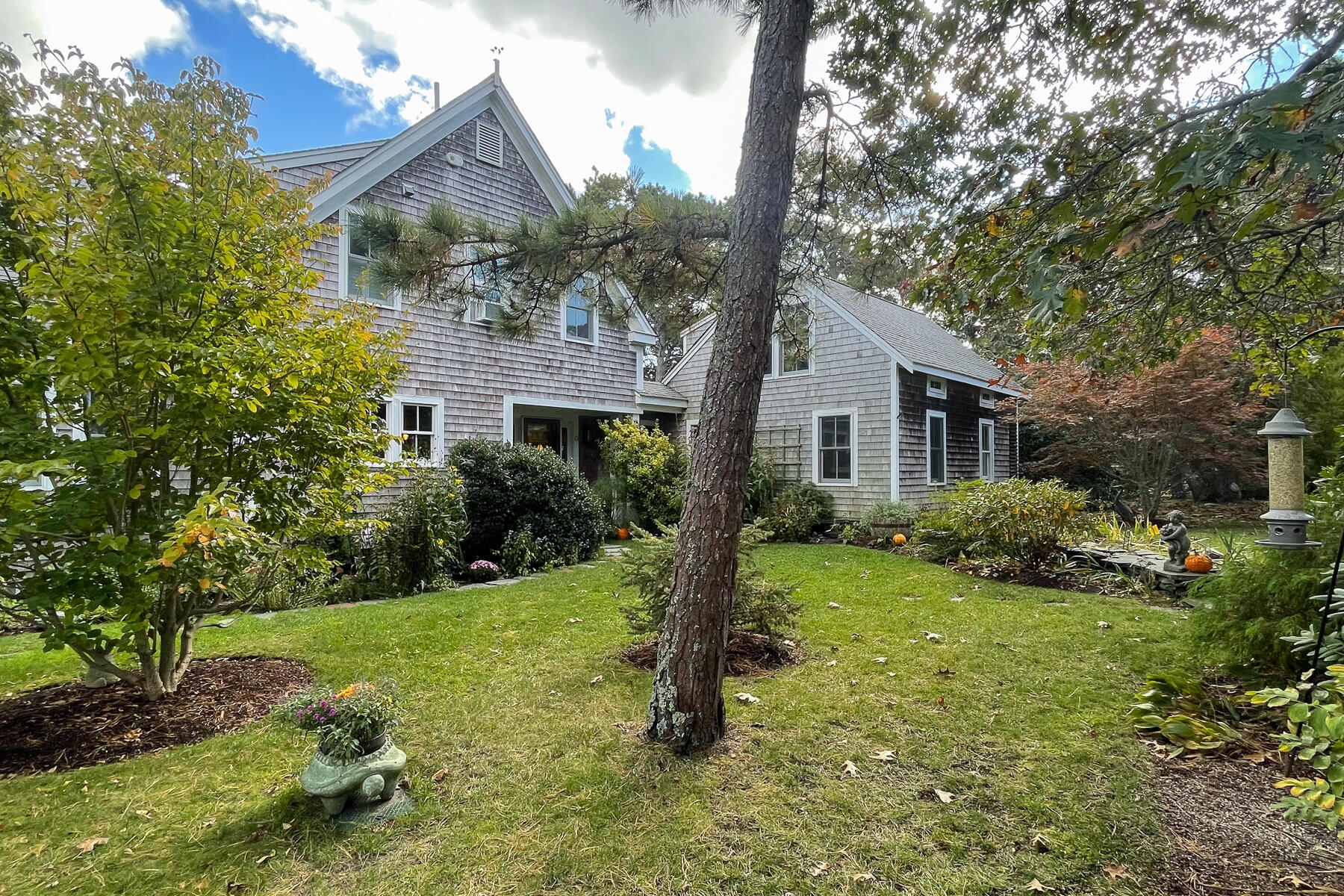 23 Forest Beach Rd Extension South Chatham, MA 02659 - Photo 9 of 43 a front view of house with yard and green space