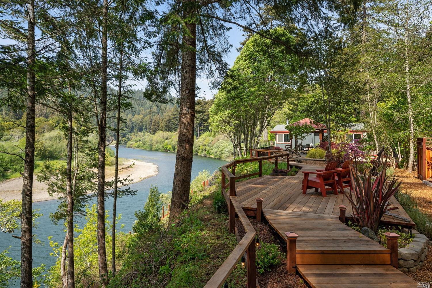 a view of a balcony with two chairs and a table