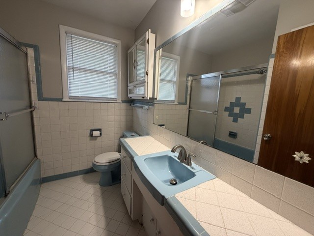 7643 Harper Road Joelton, TN 37080 - Photo 8 of 11 a bathroom with a sink toilet and shower