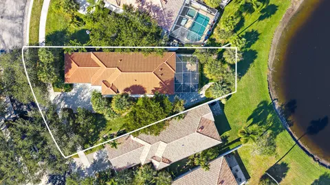 an aerial view of a house with a garden
