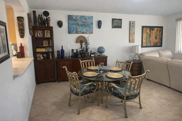 a view of a dining room with furniture
