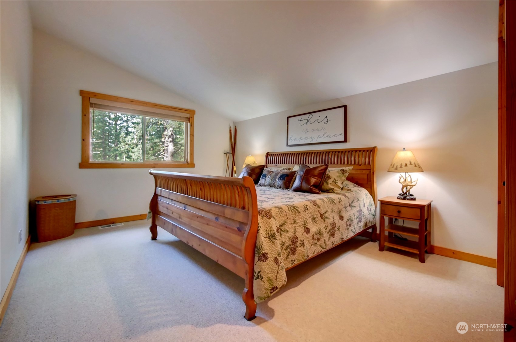 17 Mustard Mountain Road Winthrop, WA 98862 - Photo 18 of 36 a bedroom with a bed and a lamp with window