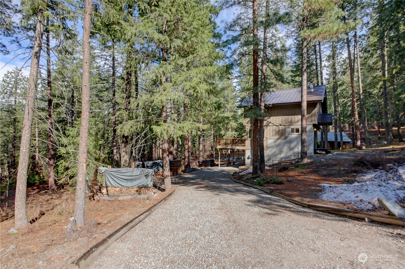 17 Mustard Mountain Road Winthrop, WA 98862 - Photo 4 of 36 a view of outdoor space with deck and tree