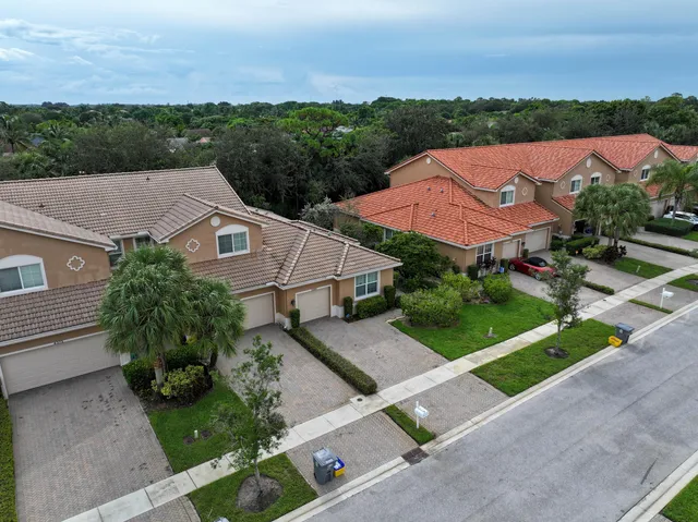 an aerial view of a house with a garden