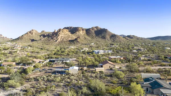 an aerial view of residential house and green space