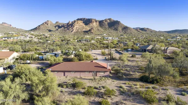 a view of a city with mountains in the background