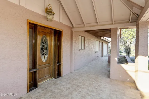 a view of a room with large windows