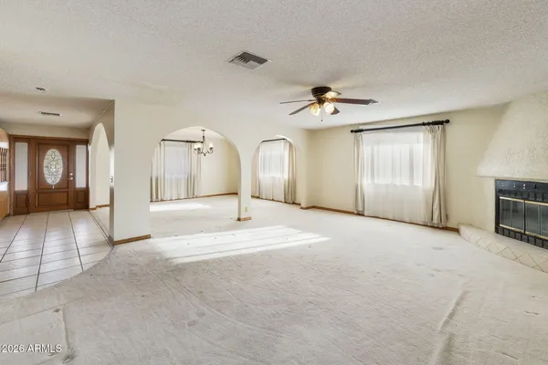 a view of a livingroom with a staircase