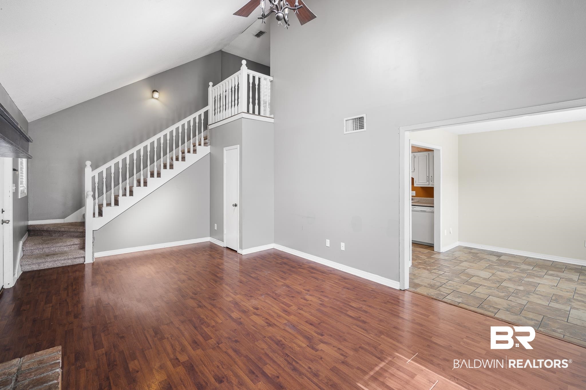 6513 Cedar Bend Court, Unit B Mobile, AL 36608 - Photo 5 of 23 View of stairs from Living Room