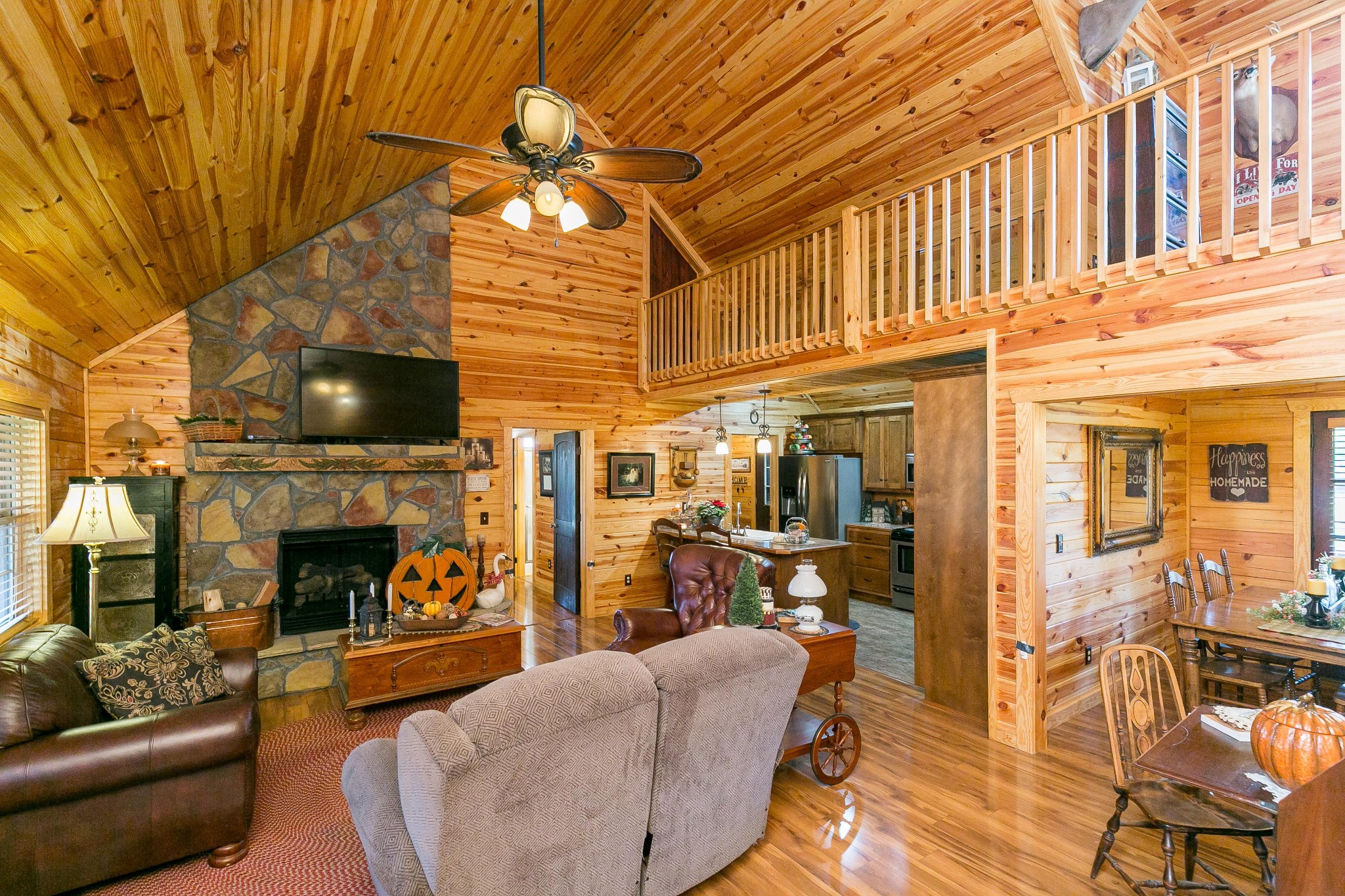 1362 Shop Springs Road Lebanon, TN 37090 - Photo 7 of 41 a living room with furniture a fireplace and a table