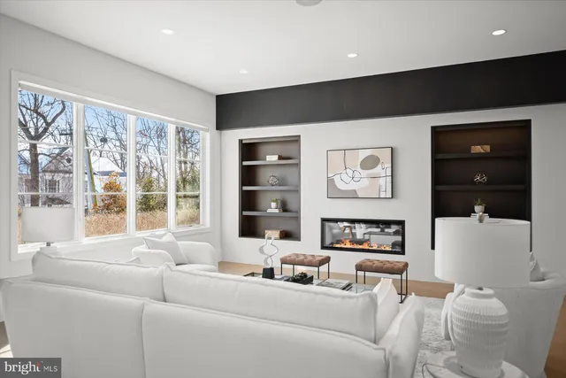 a view of a patio with table and chairs and wooden floor
