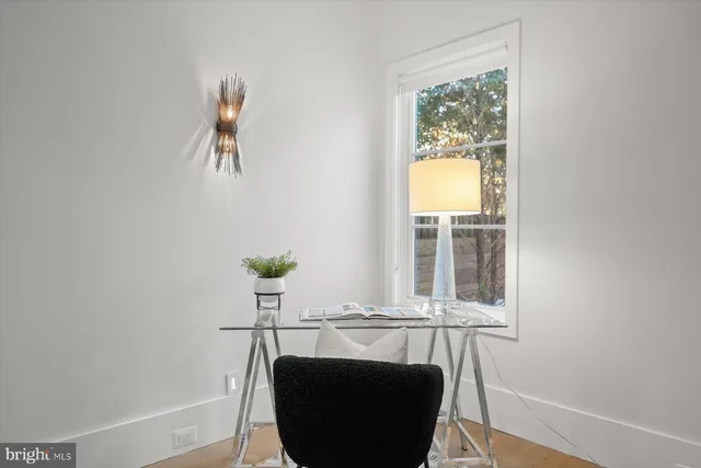 a view of a terrace with sitting area