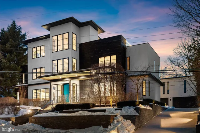 a view of a dining room with furniture wooden floor and chandelier