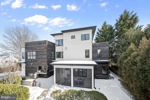 a view of an empty room with a ceiling fan