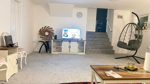 a view of a workspace with furniture