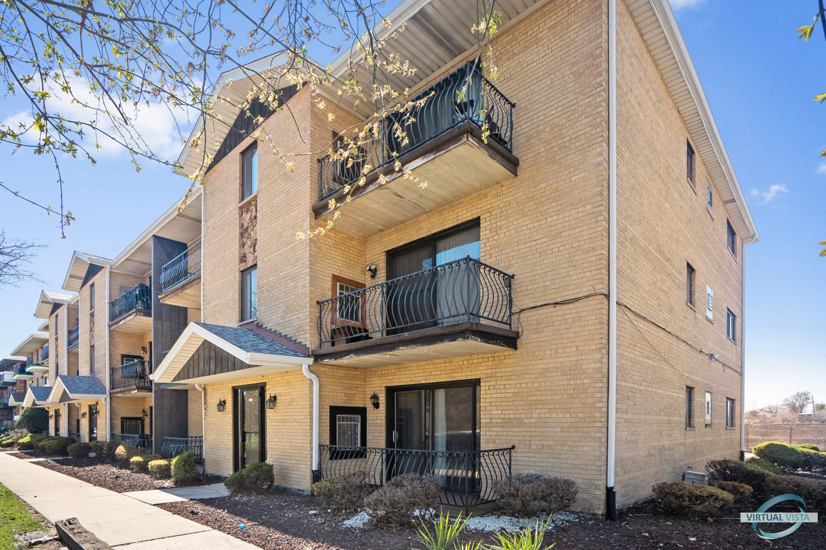 5746 106th Street, Unit 1E Chicago Ridge, IL 60415 - Photo 1 of 21 a view of a big house with many windows