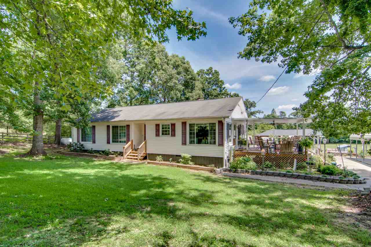 10814 Wilkins Road Bahama, NC 27503 - Photo 1 of 23 10814 Wilkins Road - Welcome home to your 7+acres of land & home! Exterior Front