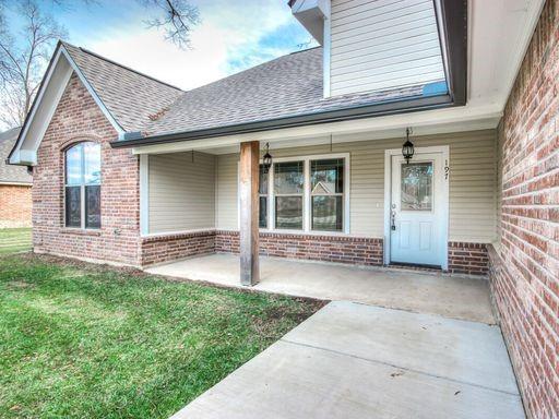 front view of a house with a yard