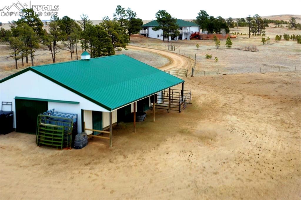 30905 Ridge Road Ramah, CO 80832 - Photo 2 of 36 a view of a yard with table and chairs