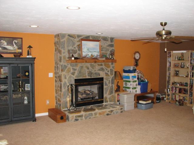 40 Keffer Road Hardy, VA 24101 - Photo 14 of 18 a living room with patio furniture and a fireplace