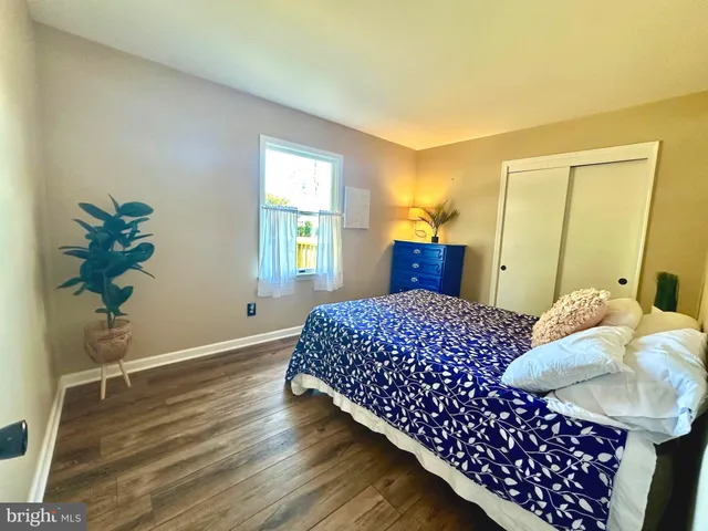 a kitchen with stainless steel appliances granite countertop a sink refrigerator stove and microwave