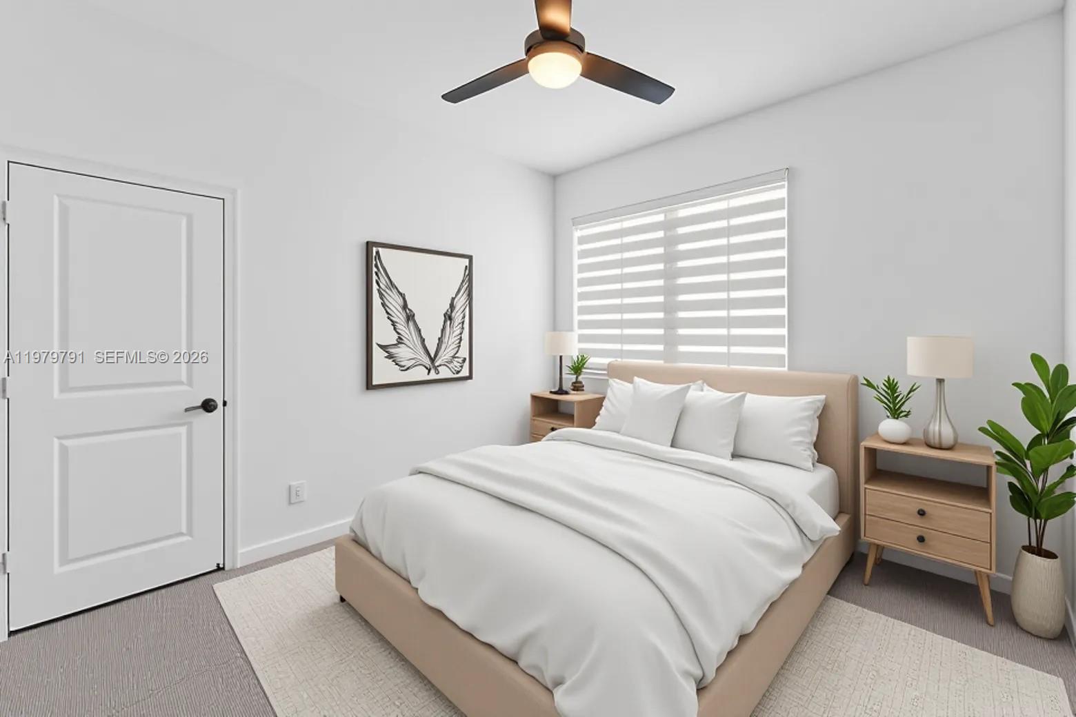 1162 Haywagon Trail Loxahatchee, FL 33470 - Photo 20 of 50 a bedroom with a large bed and a chandelier