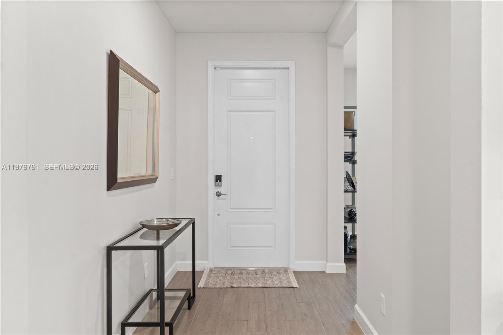 1162 Haywagon Trail Loxahatchee, FL 33470 - Photo 6 of 50 a view of a hallway with interior of the house