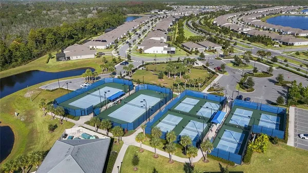 an aerial view of a house with a garden