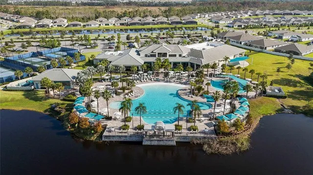 an aerial view of a house with a garden
