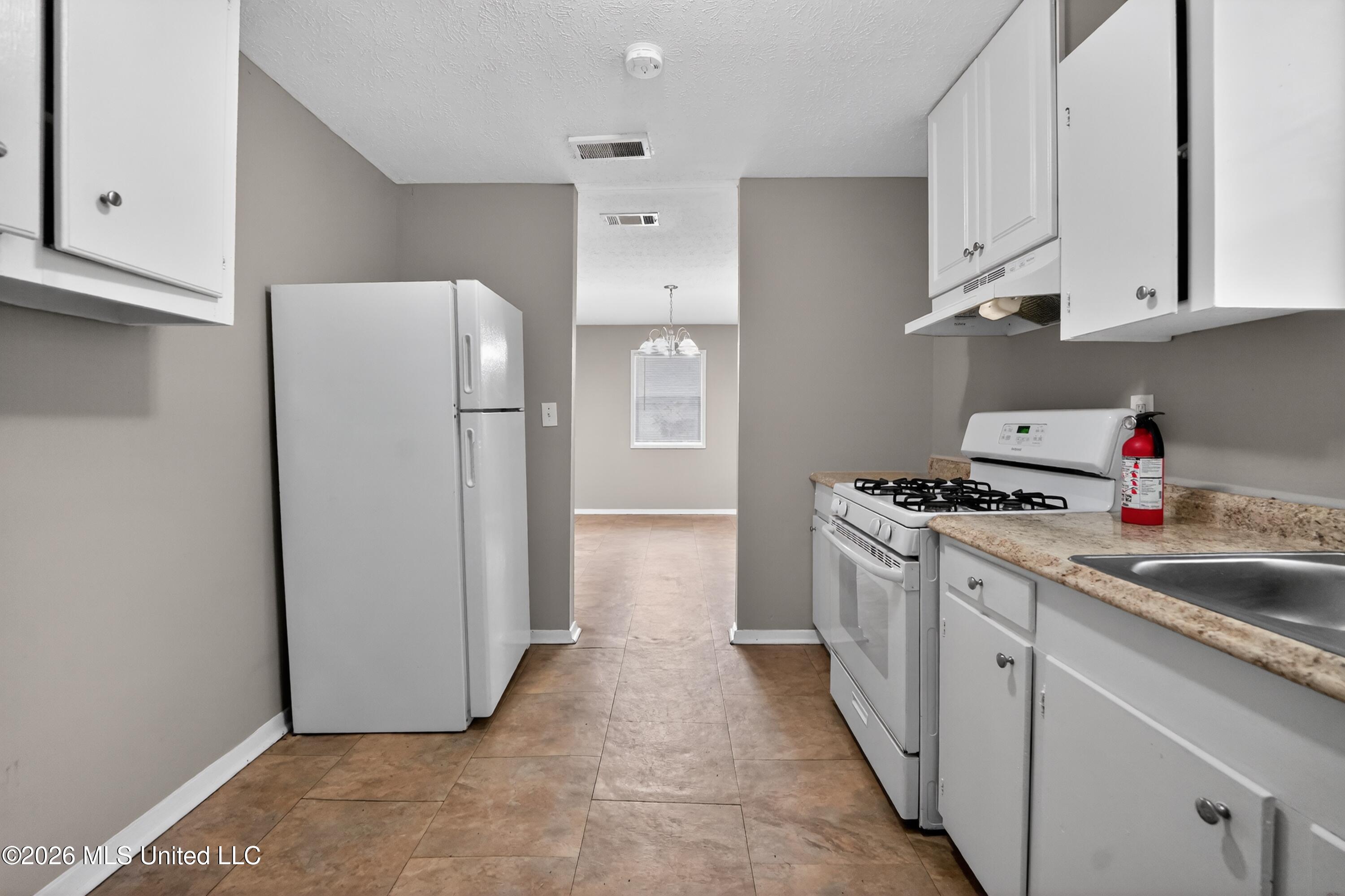 1220 Deeb Street Pearl, MS 39208 - Photo 20 of 32 20_1220_Deeb_St-Kitchen-7365