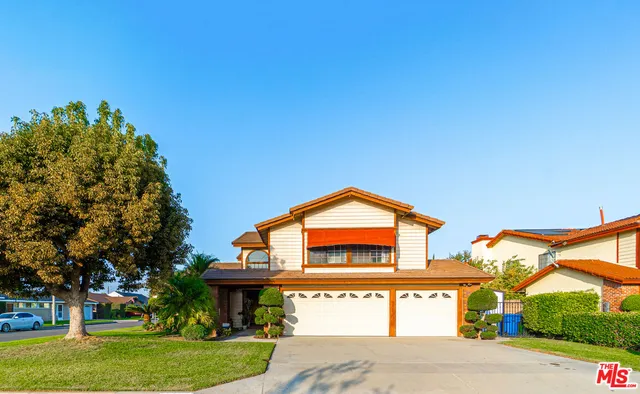 a view of a street with a building in the background