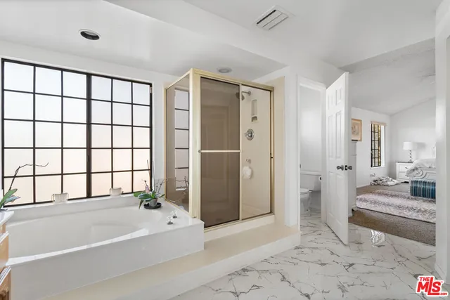 a front view of house with outdoor seating